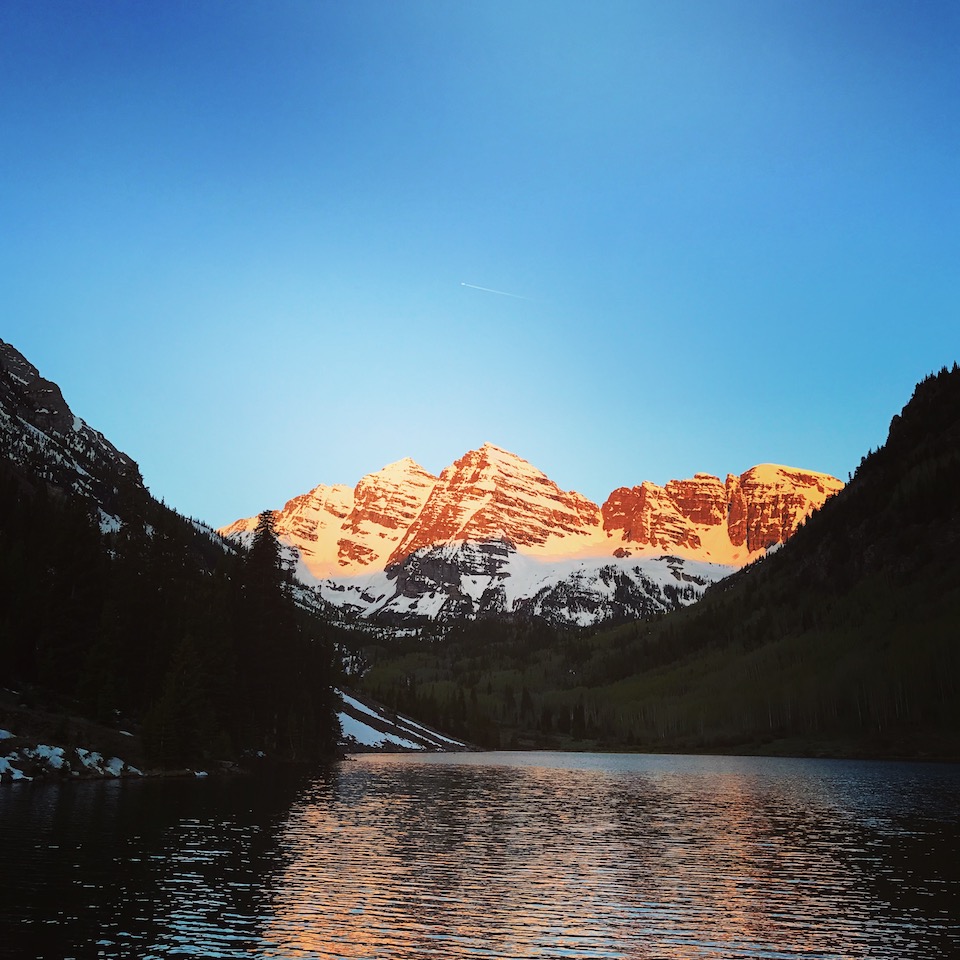 sunrise overlooking maroon bells