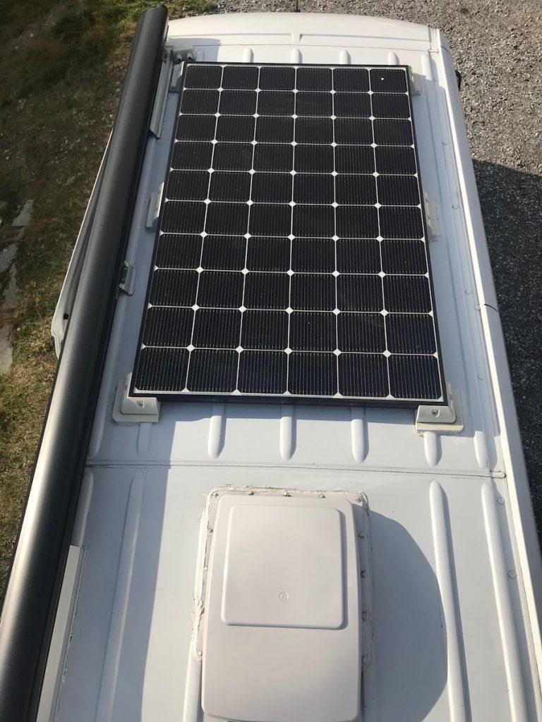 solar panels mounted to roof of van conversion